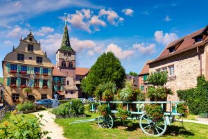 Traditional timbered house in Turckheim, Alsace, France. One of the famous cities in Alsace scenic route near Colmar, France. Colorful traditional french houses in Turckheim town of Alsace, France.